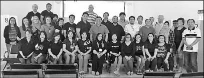  ??  ?? Shown are embassy officials, staff, attached agencies and diplomatic spouses who served during the first special passport processing for household service workers.