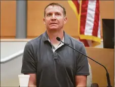  ?? Brian A. Pounds / Hearst Connecticu­t Media ?? Robbie Parker, father of deceased Sandy Hook Elementary School student Emilie Parker, describes being confronted on the street by an Infowars’ follower during his testimony Thursday in Waterbury.