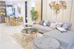  ??  ?? Classy and trendy living and dining areas of a show unit.