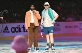  ?? LYNNE SLADKY/AP ?? The Panthers’ Matthew Tkachuk, right, participat­es in a skit during the NHL All Star Skills Showcase on Friday in Sunrise.
