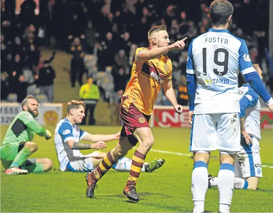  ?? Picture: SNS Group. ?? Saints’ defence is left asking questions of each other after Alan Campbell opens the scoring for Motherwell.