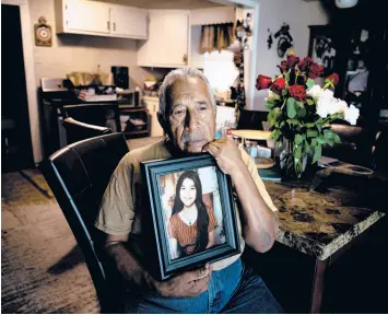  ?? MERIDITH KOHUT/THE NEW YORK TIMES ?? Victor Cabrales holds a portrait of his slain granddaugh­ter on Friday in Uvalde, Texas.“We need a change,” he says. “A real change. Not just words.”