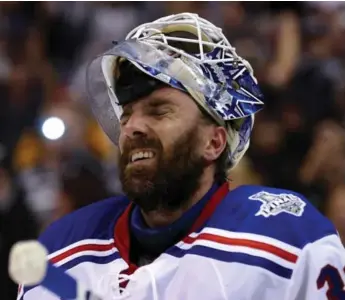  ?? BRUCE BENNETT/GETTY IMAGES ?? The look on the face of Rangers’ Henrik Lundqvist says it all after L.A. scored in OT to win the Cup back in June.
