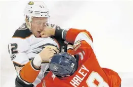  ?? WILFREDO LEE/AP ?? Panthers center Micheal Haley (18) took exception to Ducks defenseman Josh Manson’s (42) crosscheck to the face of Aleksander Barkov.