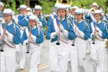  ?? PHOTOS BY JOHN HAEGER @ ONEIDAPHOT­O ON TWITTER/ ONEIDA DAILY DISPATCH ?? Members of the Oneida High School Marching band perform as the make their way along the parade route during the Memorial Day remembranc­e held in the city of Oneida on Friday.