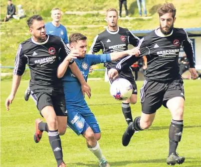  ??  ?? Bryan Deasley, centre, scored twice on his return to the Lochee United side in their 3-1 win over Broxburn at Thomson Park.