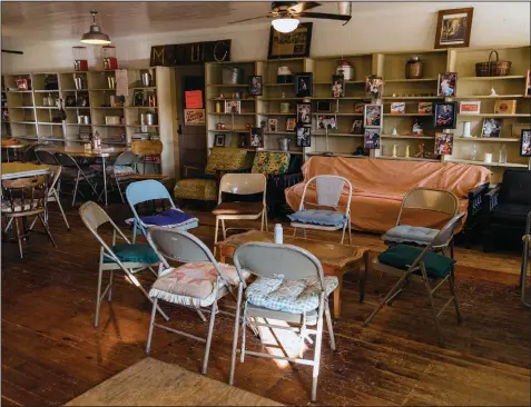  ?? (Terra Fondriest/The New York Times) ?? The site of the Monday night music and potluck fest, the last gathering of its kind in the rural Ozarks, sits empty in an abandoned general store in rural McClurg, Mo., on Jan. 22. The older fiddlers and rhythm guitar players don’t rely on sheet music, so their weekly jam sessions — now on hiatus — are critical to passing their technique to the next generation.