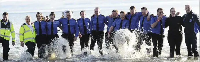  ??  ?? The Gardai, ambulance service and Mayor Smith go for a splash!