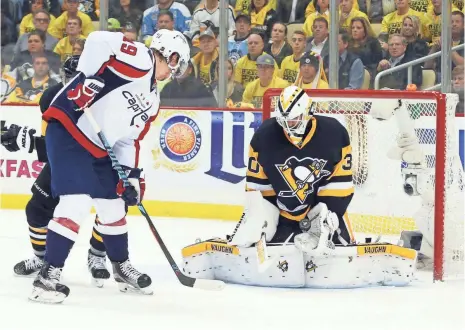  ?? CHARLES LECLAIRE, USA TODAY SPORTS ?? Penguins defenseman Brian Dumoulin says of 21-year-old goalie Matt Murray, right, “His calmness is well beyond his years.”