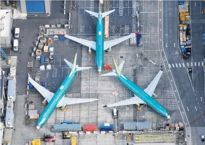  ?? PHOTO: REUTERS ?? Out of service . . . An aerial photo shows Boeing 737 Max airplanes parked on the tarmac at the Boeing Factory in Renton, Washington, in the United States, ahead of software testing this weekend.