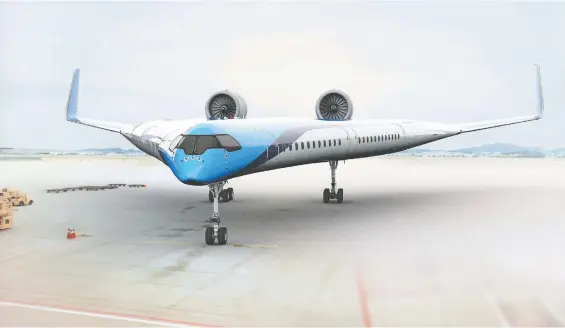  ?? PHOTOS: KLM ROYAL DUTCH AIRLINES ?? KLM and the Delft University of Technology have created the Flying-v, a futuristic-looking craft that uses 20 per cent less fuel.