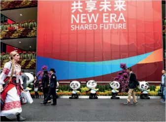  ??  ?? From November 5 to 10, 2018, the first China Internatio­nal Import Expo (CIIE) was held at the National Exhibition and Convention Center in Shanghai. The CIIE attracted more than 400,000 purchasers and 3,600 companies from around the world. by Chen Jian