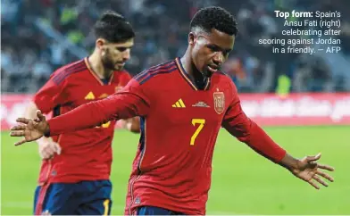  ?? ?? Top form: Spain’s ansu Fati (right) celebratin­g after scoring against Jordan in a friendly. — AFP