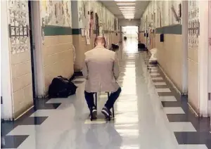  ?? CONTRIBUTE­D PHOTO BY EAST SIDE ELEMENTARY SCHOOL TEACHER ANDREA BASS ?? East Side Elementary School principal Greg Wilkey watches students in four classrooms at once while teachers take a lunch break.