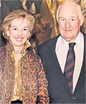  ??  ?? Wilmot-sitwell with his wife Clare on their 50th wedding anniversar­y: he was discreet about his connection to the Royal family, but it was confirmed by one anecdote which entered City folklore