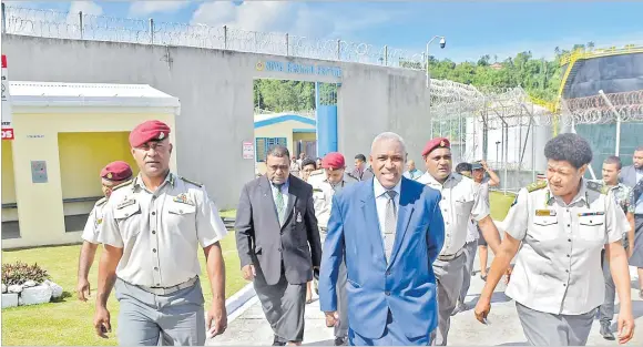  ?? Picture: ELIKI NUKUTABU ?? Attorney-General Siromi Turaga (middle) with Fiji Correction­s Service officer Kinijoji Drauna (left) and Acting Commission­er Salote Panapasa at the Suva Remand Centre yesterday.