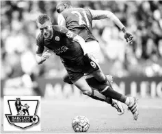  ??  ?? (FILES) This file photo taken on April 17, 2016 shows Leicester City’s English striker Jamie Vardy (L) going down in the box under pressure from West Ham United’s Italian defender Angelo Ogbonna (R) an incident for which vardy is shown his second...