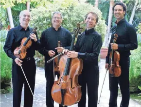  ?? FINE ARTS QUARTET ?? For more than half a century the Fine Arts Quartet has been the resident string quartet at UW-Milwaukee. Members are: Ralph Evans, violin; Efim Boico, violin; Robert Cohen, cello; and Juan-Miguel Hernandez, viola.