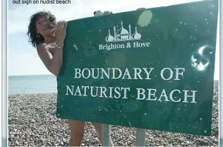  ?? ?? COVER-UP Eileen checks out sign on nudist beach