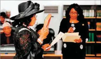  ??  ?? New Chief Judge of Lagos State, Justice Opeyemi Oke (left), taking her Oath of Office, being conducted by Director, Legislativ­e Drafting, Ministry of Justice, Mrs. Yejide Kolawole