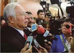  ?? PIC BY SYARAFIQ ABD SAMAD ?? Pekan MP Datuk Seri Najib Razak at the Parliament lobby yesterday.