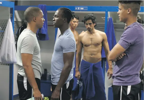  ?? — PHOTOS: PMA SCRIPTED ENTERTAINM­ENT INC. ?? From left, Karl Walcot, Emmanuel Kabongo, Jonathan Kim, Andres Joseph and Benjamin Roy in a scene from 21 Thunder. The show centres on a team of junior soccer players on the verge of the big time and co-coached by a female Olympic soccer hero.