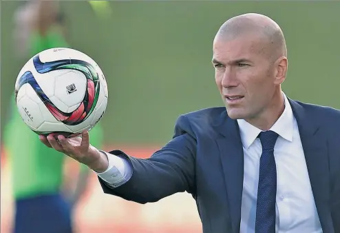  ?? GERARD JULIEN / AFP FILE ?? French soccer legend Zinedine Zidane is the new coach of Real Madrid, replacing Rafael Benitez, who was fired on Monday after just seven months at the helm.