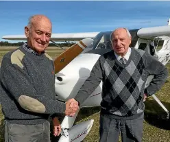  ??  ?? Derrick Hubbard celebrated his 90th birthday with a solo flight around Rangiora airfield, congratula­ted by flight instructor and former air force colleague Dave Mitchell.