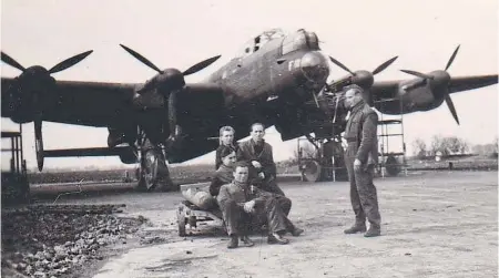  ??  ?? Airmen relax outside an RAF Lancaster in this undated family photo passed along by George CzernyHolo­wnia’s late mother, Sophie. It is not known if CzernyHolo­wnia’s dad Kazimierz is pictured, but he flew at least 30 operationa­l flights as a navigator for the RAF during the Second World War.