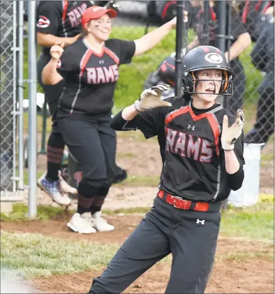  ?? Arnold Gold / Hearst Connecticu­t Media ?? Cheshire’s Danielle Floyd scores in the seventh inning to defeat Southingto­n, 4-3, on Tuesday.