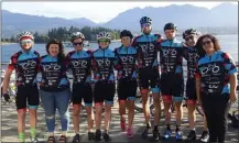  ?? Photo contribute­d ?? Cyclists with the Wheels for Wells Bike Tour pose for a photo before leaving Vancouver on Thursday. They expect to arrive in Kelowna today.