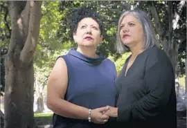  ?? Irfan Khan Los Angeles Times ?? JUDITH DOMINGUEZ, left, and Patricia Martinez have been together 29 years. One of their lawyers says the company is “using religion ... for discrimina­tion.”