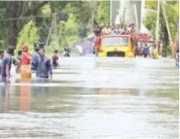  ??  ?? Relief work in progress in Thrissur, Kerala, on Saturday. Associated Press