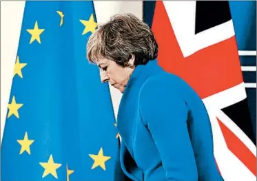  ?? EMMANUEL DUNAND/GETTY-AFP ?? British Prime Minister Theresa May insisted that she was “full of optimism” about Britain’s future despite opposition.