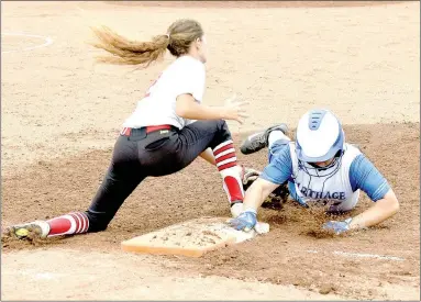  ?? PHOTOS BY RICK PECK/MCDONALD COUNTY PRESS ?? Carthage’s Sydney Peters dives back to first base to just beat a tag by McDonald County’s Leslie Yousey during the Lady Tigers 3-1 win in the Missouri Class 4 District Softball Tournament on Oct. 5 at Carthage High School.