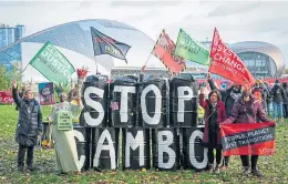  ?? ?? Friends of the Earth campaigner­s opposed Cambo at COP26.