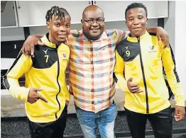  ?? Picture: SUPPLIED ?? BROTHERS IN ARMS: Birmingham City player Luntu Bobotyana, left, with club chairperso­n Vusi Khumalo and Oyisa Gxasheka after a good training session.