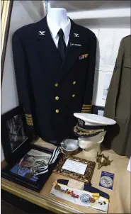  ??  ?? Berks MIlitary History Museum exhibits artifacts from the late Capt. Dan Schroeder, who was at Pearl Harbor on Dec. 7, 1941.