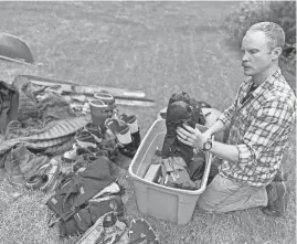  ?? PHOTOS BY EMILY RUSSELL/NORTH COUNTRY PUBLIC RADIO ?? Forest ranger Andrew Lewis says he has bought most of the gear he uses on the job, such as boots, mittens, skis, jackets and more.