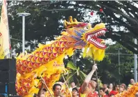  ??  ?? FIRED UP: The dragon awakened at the celebratio­ns.