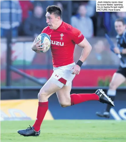  ??  ?? Josh Adams races clear to score Wales’ opening try in Santa Fe last night PICTURE: Huw Evans