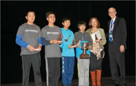  ?? SUBMITTED PHOTOS ?? The Tredyffrin/Easttown Middle School team won the Chester County MathCounts competitio­n for the third consecutiv­e year. The Tredyffrin/Easttown Middle School team members are: Andrew Huang, Andy Mei, Eric Zhao, and David Wang, who were coached by Lisa...