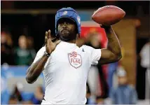  ?? MARCIO JOSE SANCHEZ / AP ?? QB Michael Vick throws during a flag football exhibition game last month in San Jose, Calif. Vick’s Roadrunner­s lost Saturday to Chad Johnson’s Team Ocho at Kennesaw State.