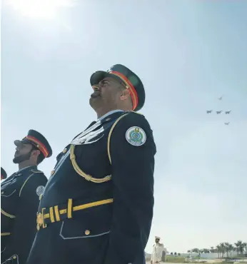  ??  ?? Military jets perform a fly-by over Wahat Al Karama Hamad Al Mansouri / Ministry of Presidenti­al Affairs