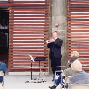  ?? Ben White / Contribute­d photo ?? The New Haven Symphony has offered outdoor performanc­es at Canal Dock in New Haven.