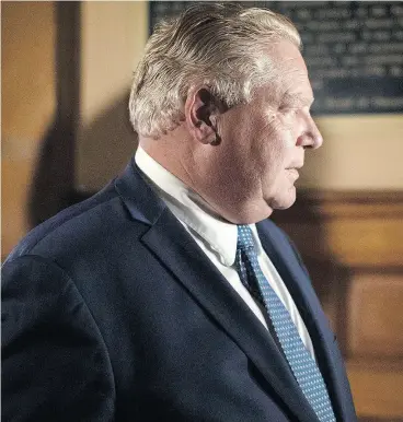  ?? CHRIS YOUNG / THE CANADIAN PRESS FILES ?? The government of Ontario Premier Doug Ford will retain a significan­t amount of the program spending that the Liberals were paying for with their cap-and-trade revenue.