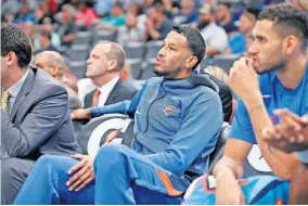 ?? [BRYAN TERRY/ THE OKLAHOMAN] ?? Andre Roberson, who has yet to play this season for the Thunder, sits on the bench during a preseason game against the Memphis Grizzlies at Chesapeake Energy Arena in Oklahoma City on Oct. 16.