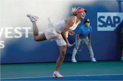  ??  ?? STANFORD: Maria Sharapova of Russia competes against Jennifer Brady of the United States during day 1 of the Bank of the West Classic at Stanford University Taube Family Tennis Stadium on Monday in Stanford, California. — AFP