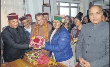  ?? PTI ?? Himachal BJP chief Rajeev Bindal greets party candidate Indu Goswami (centre) as chief minister Jai Ram Thakur (right) looks on in Shimla on Friday.