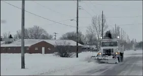  ?? SARA Waite / Sterling Journal-advocate ?? A city plow pushes snow from the side of Sidney Avenue after a 2016 storm.